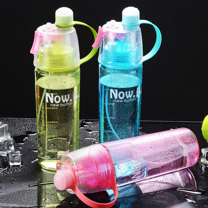 Sports water bottle with built in sprayer